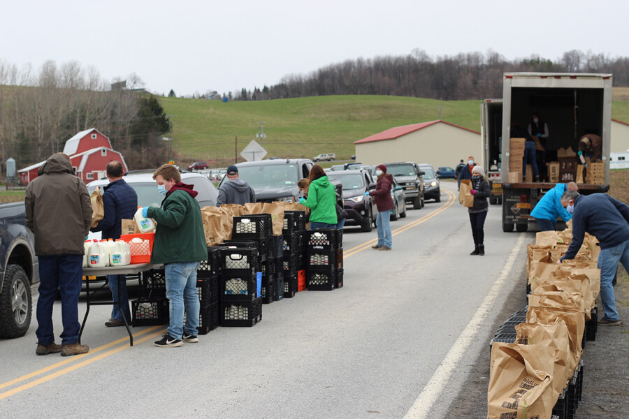 2021 Cap Creal Winner. Volunteers from SUNY Morrisville give out dairy products to community residents.